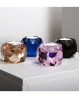 Moderne fyrfadsstager i farverigt krystalglas. Spred glæde og hygge i hjemmet med farverige fyrfadsstager.