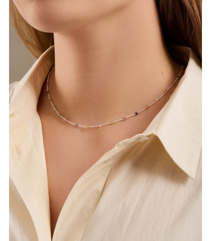 Meget smuk og elegant halskæde i forgyldt sølv. Rainbow halskæden har fine små sten fordelt på kæden.