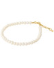 Smukt og unikt perlearmbånd fra Pernille Corydon. Feminint armbånd med hvide perler hele vejen rundt.