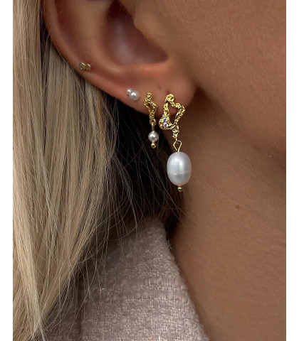 Feminine øreringe i perfekt kombination. Sådan kan du kombinere øreringe så det ser elegant og let ud.