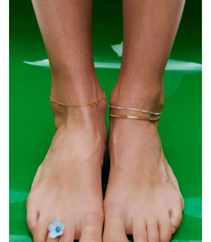 Pift dit sommer outfit op med ankelkæde fra Pernille Corydon.