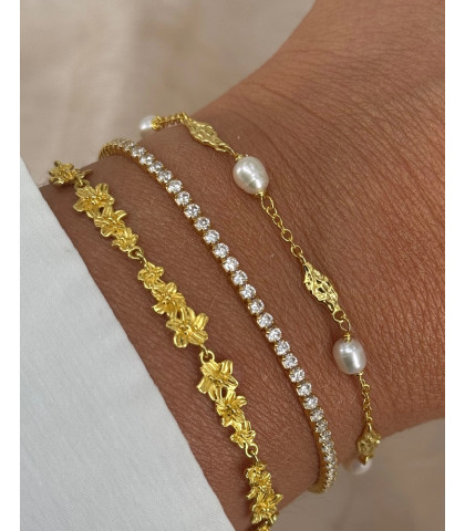 Kombiner gerne det moderne tennis armbånd med andre af dine yndlings armbånd og skab dit eget personlige udtryk.