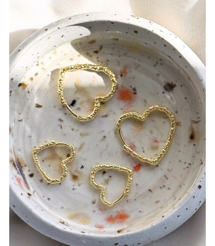 Aqua Dulce ørering formet som et hjerte. Den perfekte gave til kæresten - vis hende din kærlighed med et par smukke hjerte-øreringe.