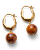 Smukke unikke øreringe fra Pernille Corydon. De unikke Earth øreringe har de glatte, runde Tiger Eye sten som giver elegant look