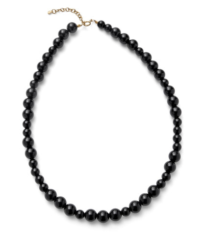 Pernille Corydon halskæde med smukke sorte onyx-sten, der reflekterer lyset som stjerner på en klar vinternat. 