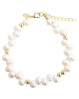 Dette tidløse Aqua Dulce armbånd er fremstillet af forgyldt sterling sølv og designet med blankpolerede kugleled og ægte hvide ferskvandsperler, der er elegant placeret langs kæden. 